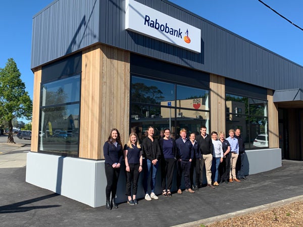 Members of the Rabobank Southland outside the new office in Gore. From left: Tessa Kelly, Paigan Marshall, Courtney Miller, Farryn Mitchell, Mark Hunter, Linda Taggart, Sam Dodunski, Tryphena Carter, Sue Lapthorne, Angus Larsen & Richard Bishop