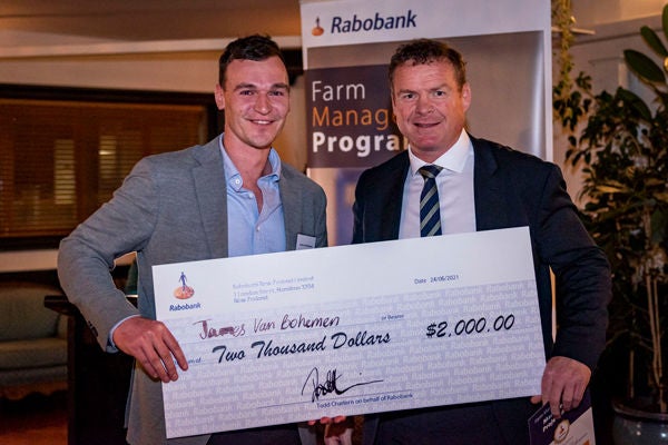 James Van Bohemen receives the Rabobank Business Management Award and cash prize from Rabobank NZ CEO Todd Charteris